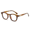 Retro tortoise shell round sunglasses with metallic hinge accents on white background - Tortoise Frame Clear Lens