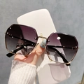 Gafas de sol retro poligonales sin montura con lentes degradadas moradas y estuche - Marco Dorado Degradado Café