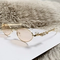 Occhiali da sole ovali Y2K in metallo dorato con lenti rosa e strass sulle aste - Montatura Oro/Lenti Champagne