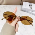 Fashionable rimless oval sunglasses with brown gradient lenses and rhinestone F detail - Transparent Tea