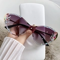 Lunettes de soleil œil de chat sans monture avec verres dégradés violets et strass - Monture Dorée Verres Gris Dégradés