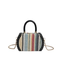 Detail of colorful woven straw bag featuring black leather handles and rivet trim accents - Rainbow Black