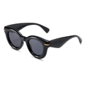 Gafas de sol ovaladas negras gruesas con lentes grises y detalles dorados - Montura Negra Lentes Gris Negro