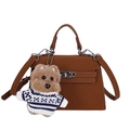 Brown faux suede Kelly style handbag with a cute plush dog charm and crossbody strap - With Pendant / Brown