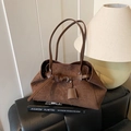 Dark brown faux suede tote bag with buckle strap and thin shoulder handles - Brown