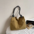 Detail of mustard yellow corduroy tote bag with black and white checkered rope handles - Yellow