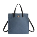 Blue denim tote bag with black leather handles and golden twist lock closure - Light Blue