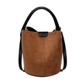 Vintage brown suede bucket bag with black leather handles and shoulder strap on white background - Yellow Brown