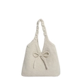 Creamy knit tote bag with bow detail and braided handles for an autumn casual style - White