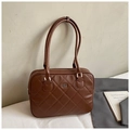 Macro detail of brown quilted leather texture and silver COIH 2DN metal logo on shoulder bag - Brown Small No Pendant