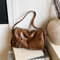 Brown vintage faux leather tote bag with silver metal buckles and rivet details - Brown