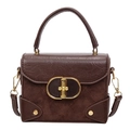 Dark brown faux leather crossbody handbag featuring classic quilted pattern and gold hardware - Brown
