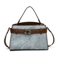 Light blue denim handbag with brown leather trim and silver twist lock closure - One Size / Blue