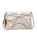 Elegante bolso de hombro blanco crema con un lazo grande y un llavero de cuentas - Blanco Roto