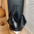 Large capacity black hobo tote bag with stylish underarm shoulder strap and glasses detail - Black