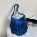 Chic cobalt blue faux suede crossbody bag featuring long bohemian fringe and wide strap - Blue