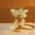 Elegant long cream flower petal tassel earrings with gold chain and crystals - E4415