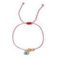 Red and white woven bracelet featuring a golden cross charm and blue turquoise bead detail - Red White Spiral Cross Turquoise (TDS-B24043001A)