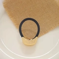 Black elastic hair tie with minimalist gold U-shaped metal accent for stylish hair styling - KC Gold Small Oval Hair Tie