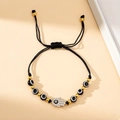 Handmade black cord Hamsa Hand bracelet with evil eye beads and adjustable knot - Black
