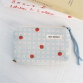 Close-up of strawberry embroidery on light blue checkered corduroy coin purse detail - Plaid Strawberry