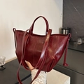 Vintage wine red tote bag with glossy wrinkled texture and drawstring details - Burgundy