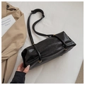 Minimalist black baguette bag with glossy wrinkled leather and golden eyelet detail - Standard Type / Black