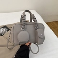Grey pebbled leather Boston bowling bag with matching mini pouches and shoulder strap - Gray