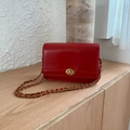 Borsa a tracolla rossa in pelle con catena dorata e chiusura a girello in metallo - Rosso