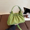 Avocado green pleated dumpling bag in matte suede finish with detachable strap - Green
