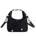 Elegante borsa a secchiello nera con pois argentati e fiocco, mostrata come borsa a mano - Nero