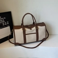 Retro canvas duffle bag in beige with dark brown leather straps and gold hardware - Coffee