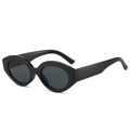 Occhiali da sole retrò cat-eye con montatura ovale nera lucida e lenti scure - Montatura Nera Lenti Grigio Nero
