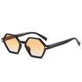 Lunettes de soleil polygonales rétro avec monture noire et verres dégradés orange sur fond blanc - Monture Noire Verres Thé