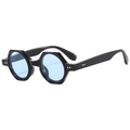 Retro geometric hexagonal sunglasses with black frame and light blue lenses from a side view - Glossy Black Blue