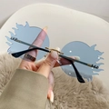 Lunettes de soleil flamme sans monture avec verres bleu clair et pont en métal doré - Monture Dorée Verres Bleus