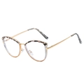 Cat eye glasses frame in gold metal and tortoiseshell pattern shown at a 45-degree angle - Tortoise Tea Frame