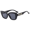 Gafas de sol cat-eye grandes en negro con detalles de anillos dorados elegantes - Montura Negra Lentes Gris Negro