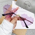 Fashionable rimless heart-shaped sunglasses with purple wave-cut lenses and gold metal bridge - Gold Frame Purple Lens