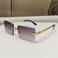 Lunettes de soleil sans monture avec verres dégradés violets et branches serpent dorées - Monture Dorée Verres Dégradés Gris