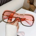 Occhiali da sole oversize senza montatura con lenti sfumate rosa-arancio e metallo oro - Montatura Oro Lenti Sfumate Rosa