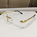 Frameless rimless sunglasses featuring unique gold snake metal temples and clear lenses - Gold Frame Clear Lens