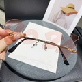 Handgehaltene 2024 randlose Neuheit Sonnenbrille mit rosa Gläsern und Goldmetallrahmen - Goldener Rahmen Rosa Gläser