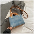Blue denim and brown leather handbag with gold metal hardware in a stylish design - Denim Blue Without Pendant