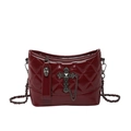 Quilted burgundy crossbody bag with silver cross, skull charm, and chain strap - Burgundy