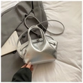 Minimalist silver dumpling bag with metallic pleated texture and top handle - Silver No Pendant