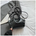 Minimalist black dumpling tote bag in glossy oil wax finish with adjustable strap - Black without Pendant