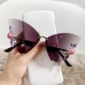 Frameless butterfly wing sunglasses with purple gradient lenses and rhinestone floral accents - Gold Frame Gradient Grey
