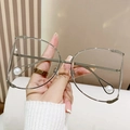 Silver metal oversized glasses featuring elegant large pearl details on the temples - Silver Frame Clear Lens