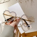 Lunettes de soleil cœur sans monture avec strass dégradés sur cadre en métal doré - Monture Dorée Verres Ambrés
